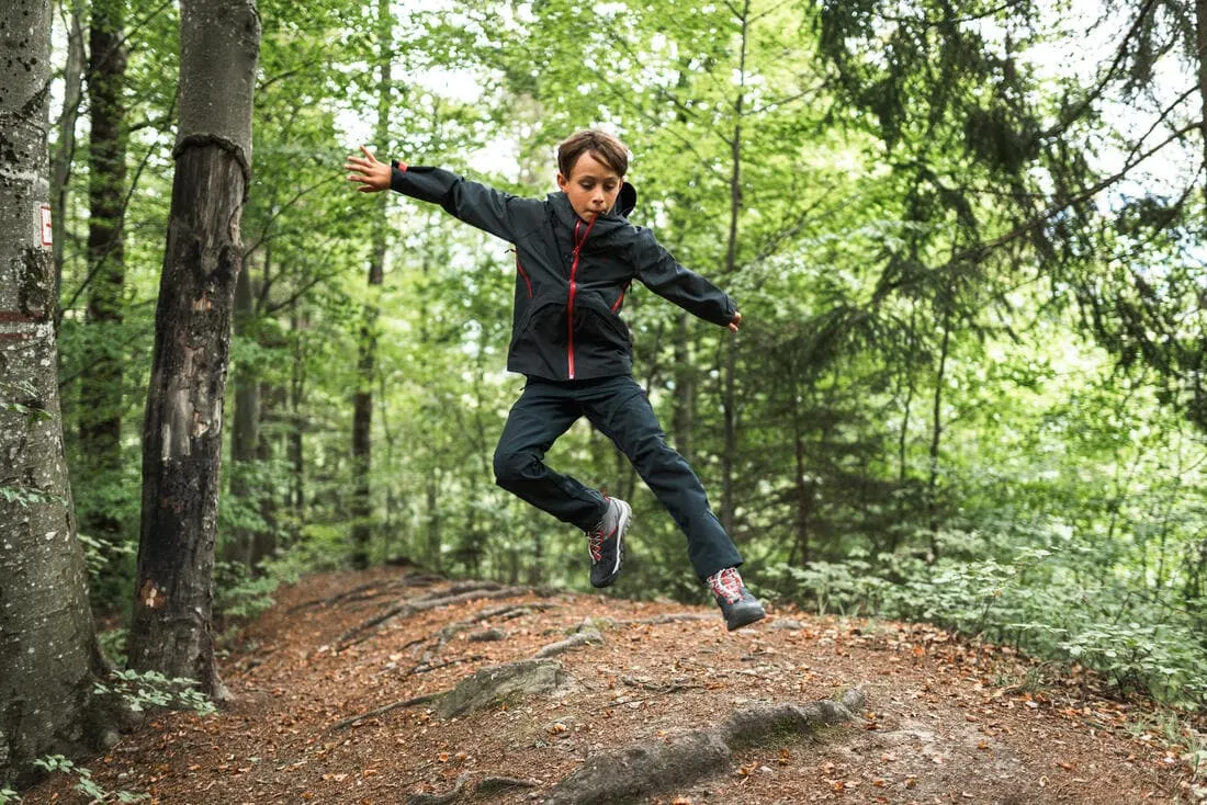 Pantalon de randonnée softshell - mh550 noir - enfant 7-15 ans